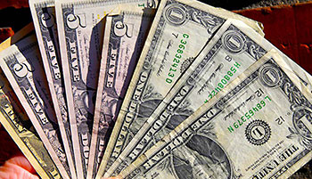 US dollars displayed in hand